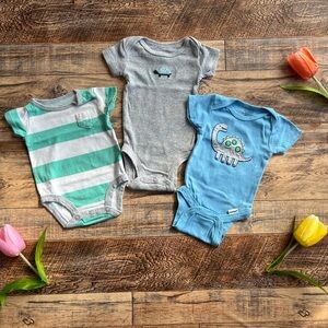 Set of Three Baby Onesies in Blue, Gray, and Green
